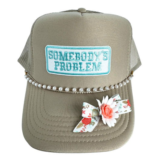 SOMEBODY'S PROBLEM TRUCKER HAT